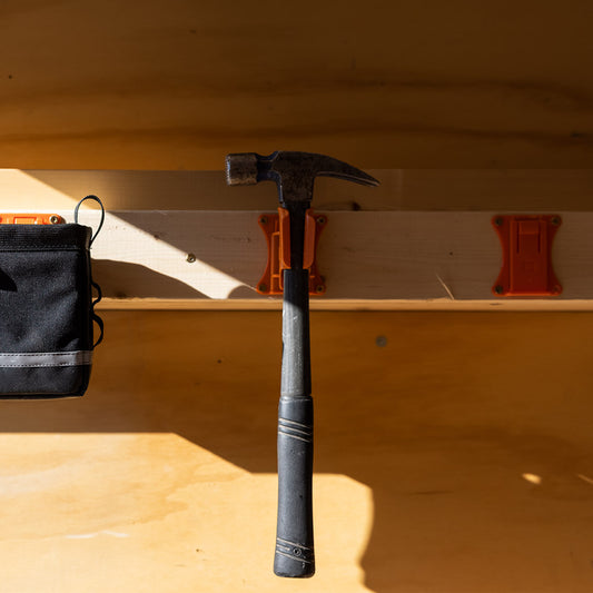 SwatClips Wall Mount storing tools in a trailer